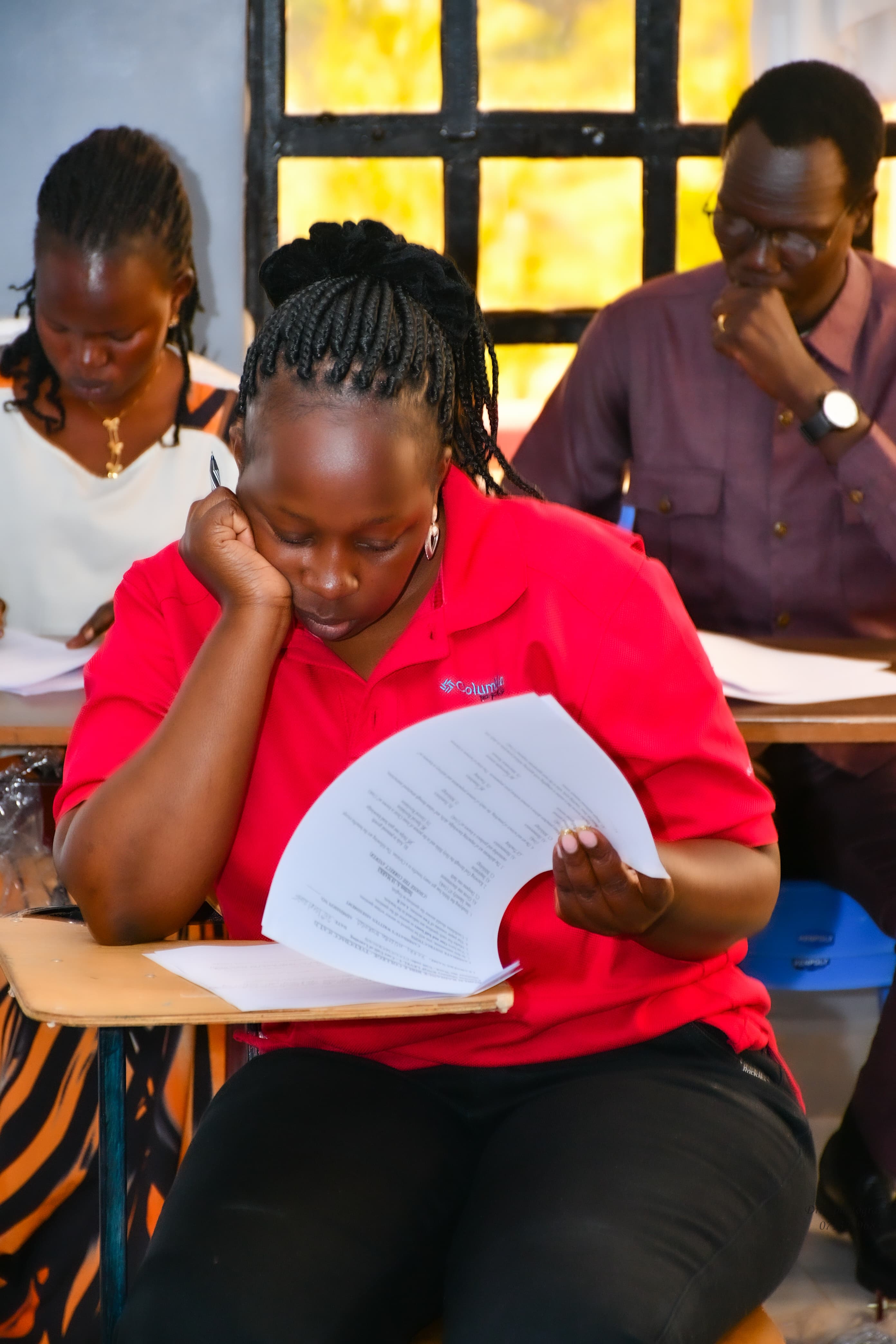 Student reading through her paper during an assessment